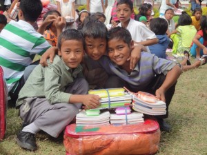 Children at Gilgal Children's Home receiving school supplies