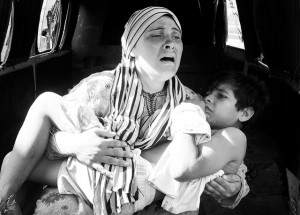 Women holding Syrian Child