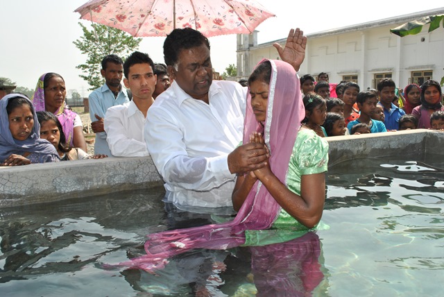 Subela taking baptism