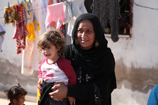 Syrian Women and her child in Jordan Refugee Camp